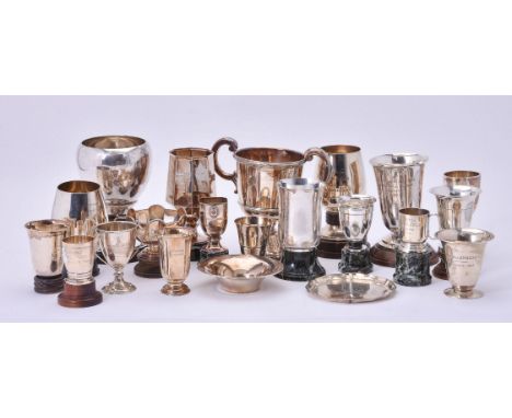 An accumulation of silver and silver coloured golfing trophy cups and similar, mainly Belgian, early to mid-20th century, sta