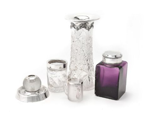 Five silver mounted glass items, comprising: a cut glass tapered vase, maker's mark over-struck, Birmingham 1910, 24.5cm (9 3