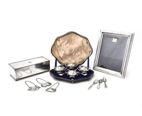 A collection of silver, comprising: a set of four twin handled salt cellars by James Ramsay, London 1910, in a leather covere