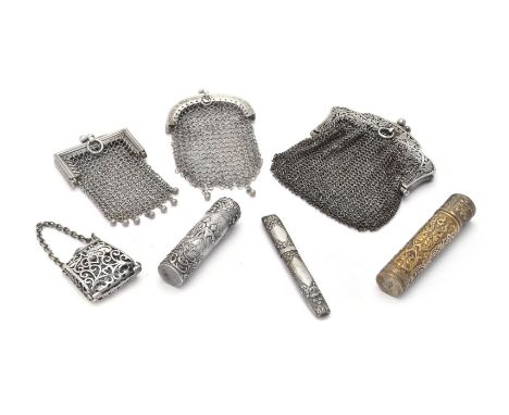 A Continental cylindrical scent phial or bottle, unmarked, circa 1900, 5.2cm (2 1/8in) high; two Continental mesh purses, one