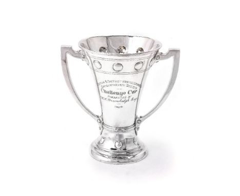 A silver twin handled flared trophy cup by Edward Barnard &amp; Sons Ltd, London 1926, with angular handles, a bead band to t