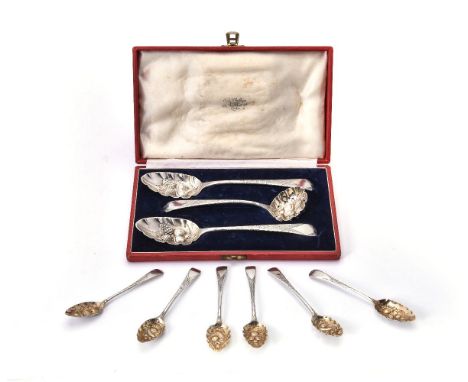 A suite of three berry spoons and a sifting spoon, the old English silver table spoons, London 1794, the sauce ladle, 1786, l