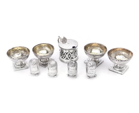 A set of four George III silver circular pedestal salt cellars by Peter, Ann &amp; William Bateman, London 1799; a set of fou