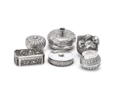 Five Asian silver boxes, one Cambodian, stamped 90%, 20th century, shaped and chased with a Ramayana character, 7cm (2 3/4in)