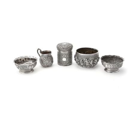 Four Indian silver items, circa 1900, comprising: a pair of footed condiment bowls by Dass &amp; Dutt, Bhowanipore, Calcutta,