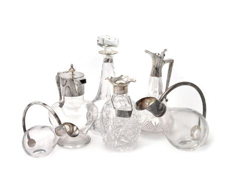 Five silver mounted clear glass items, comprising: a late Victorian claret jug by Charles Edwards, London 1896, 23cm (9in) hi