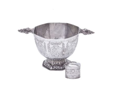 A Dutch silver deep octagonal bowl, pseudo marks, 1814-1953 1st standard, with twin handles cast and pierced with masks and s