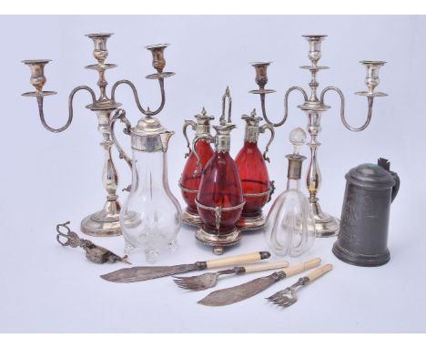 ϒAssorted silver plate, including: a late Victorian trefoil decanter stand, with three ruby glass jugs, 34cm (13 1/4in) high;