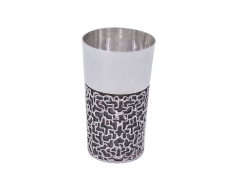 A silver flared beaker by Stuart Devlin, London, 1969, the lower part with soldered filigree, 11cm (4 1/4in) high, 227g (7.3 