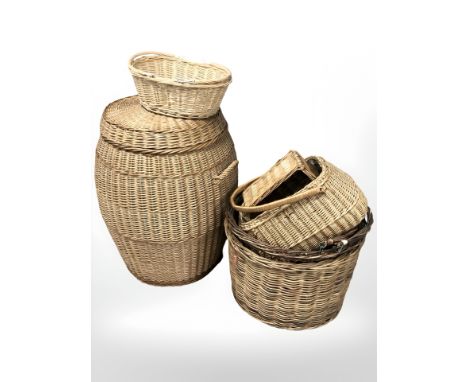 A wicker hamper, height 62 cm, and several baskets.