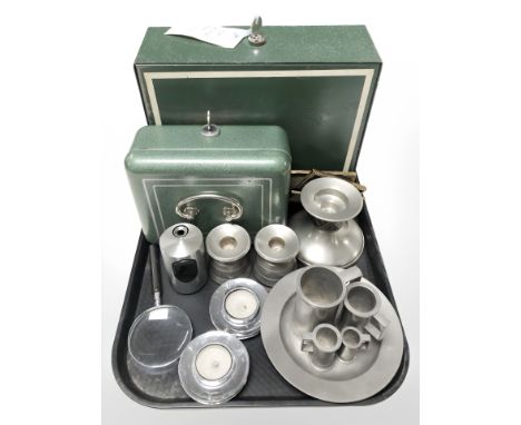 Two metal cash tins, pewter tankards, stainless steel tea light holders, magnifying glass, etc.