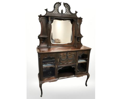 A late Victorian carved mahogany mirror back chiffonier, 123 cm x 44 cm x 201 cm.