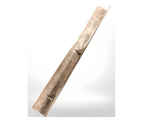 A carved oak wall shelf depicting hunting dogs perusing deer, length 200 cm