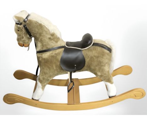 A Mamas & Papas rocking horse 