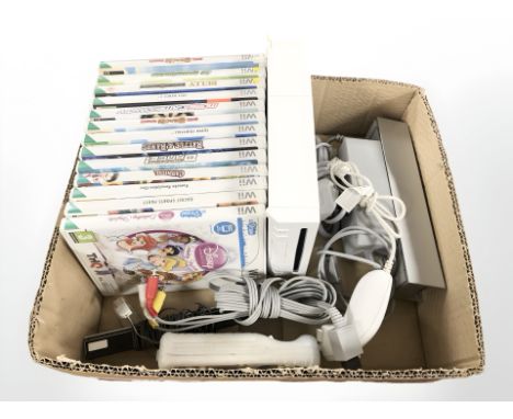A Nintendo Wii console, controllers and various games. (1 box)