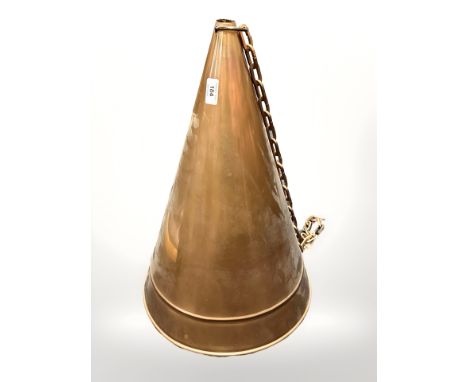 A 20th century Scandinavian copper conical light shade, height 58 cm.