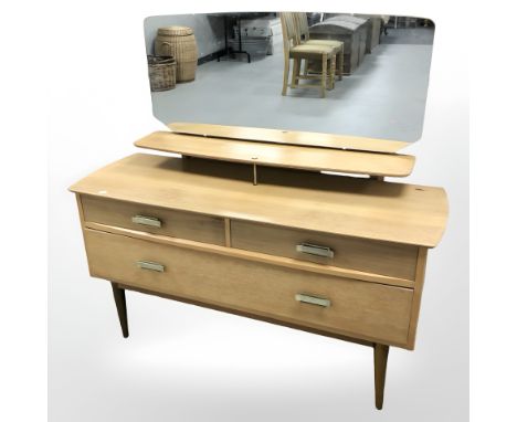 A Lebus oak mirror backed dressing chest, 117 cm wide x 41 cm deep x 111 cm high