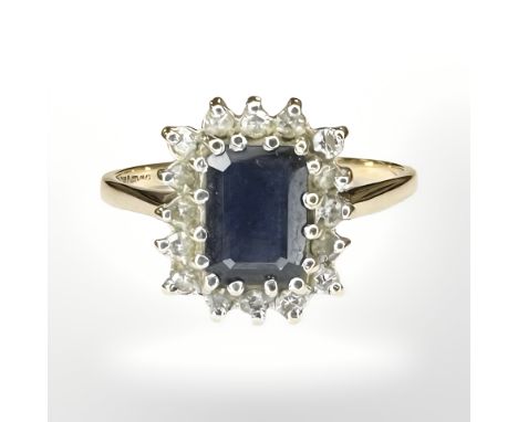 A 9ct yellow gold sapphire and diamond cluster ring, size O. CONDITION REPORT: 2.4g.