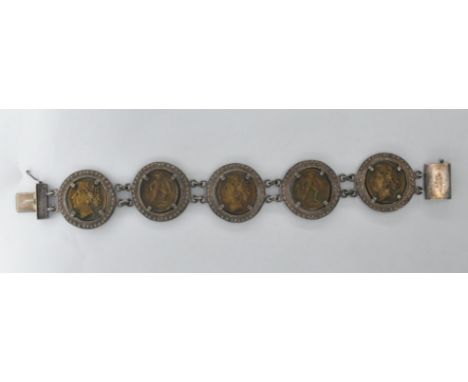 A Greek 800 silver bracelet chain having 6 large mounts inset with greek roman coins. The clasp marked 800 with Greek hallmar