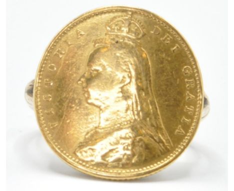 An 1892 half sovereign 22ct gold coin having an old head and shield to the verso mounted on a 9ct gold ring with split should