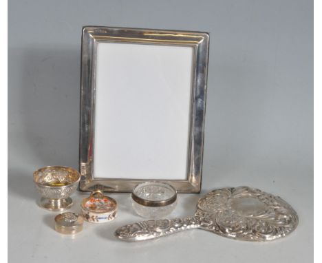 A collection of antique and later hallmarked sterling silver items comprising of an antique silver vanity mirror,&nbsp; silve