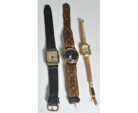 Three vintage early 20th century watches to include a black faced services watch with unusual star and crescent markings, lum