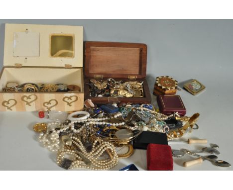 A large collection of costume jewellery to include watches, bracelets, bangles, earrings, brooches, clips, necklaces, pendant