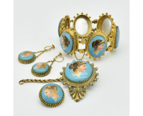 A 19th century continental enamel portrait parure. The set comprising of bracelet, large brooch clip, earrings and a smaller 