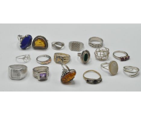 A collection of stamped 925 silver rings to include several stone examples such as a ladies ring set with faux malachite and 