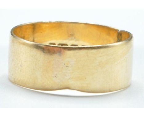 A stamped 18ct gold ring band. Bearing hallmarks for Birmingham, datemark R, 18. Gross weight 3.9g