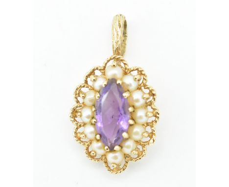 A hallmarked retro 9ct gold / 375 marked amethyst and half pearl cluster pendant. The pendant with marquise cut amethyst with