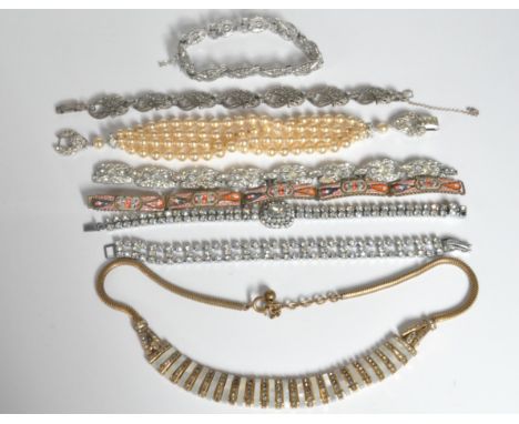 A collection of vintage 20th Century jewellery to include two white metal marcasite set bracelets, three bracelets set with w