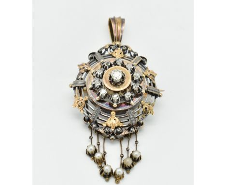 A French 18ct gold and diamond brooch pin pendant. The pendant set with an old cut diamond surrounded by further old cut diam