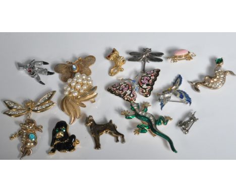 A group of fifteen vintage mid Century animal brooches to include a terrier dog brooch marked CHS, an a green enamelled lizar