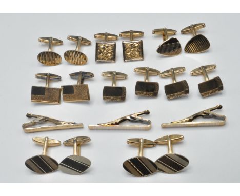 A collection of gentleman's gold on silver cufflinks of various styles of shapes, some having unengraved initial panels, bark