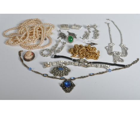 A collection of vintage 20th century costume jewellery to include gold plated necklaces, faux pearls, brooches, rings, cameo 