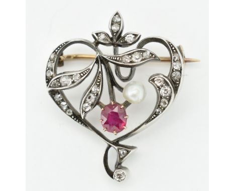 An antique ruby diamond and pearl brooch pin . The brooch having an open work Belle Époque heart design of diamond set foliat