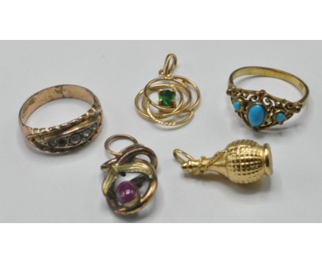 A group of 20th Century jewellery to include an 18ct gold ewer bottle charm (weight 1.6g), a gold open work pendant set with 