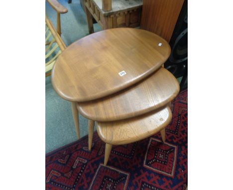 Set of 3 Ercol Pebble tables in Light Elm supported on tapering legs