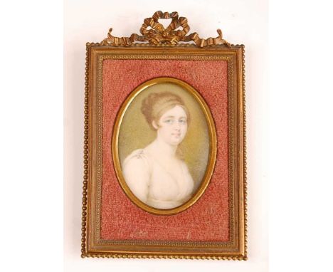 Attributed to P. Gaslini - Bust portrait of a young woman, miniature watercolour on ivory, 68 x 52mm, housed in a gilt brass 