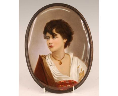 A KPM porcelain plaque depicting a bust portrait of Ribera 'The poor Italian boy who became a great painter', signed with mon