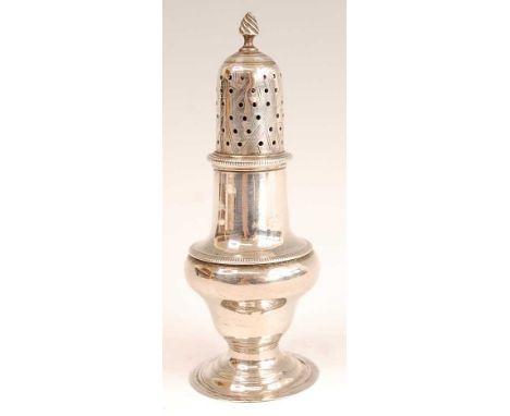 A George III silver pedestal lighthouse sugar caster, having flaming torch finial, 2.7oz, maker Charles Hougham, London 1782,