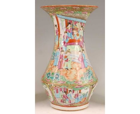 A 19th century Chinese Canton famille rose vase, enamel decorated with ceremonial figure scenes within gilded borders, h.35cm