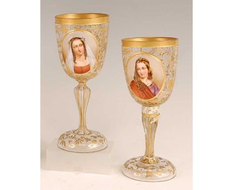 A pair of 19th century Bohemian overlaid glass pedestal goblets, each enamel decorated with bust portraits of young women wit