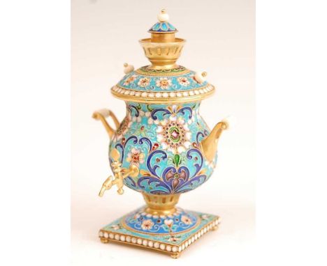 A Russian silver gilt and enamel decorated miniature samovar with cover, impressed 84 mark verso, h.10cmCondition report: Exc