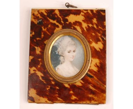 19th century English school - Bust portrait of a young woman wearing her hair up, miniature watercolour on ivory, 37 x 30mm, 