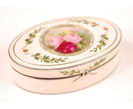 An early 20th century Swedish silver and enamel trinket box with porcelain inset plaque, of oval form, the enamelled and gold