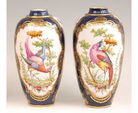 A pair of Paris porcelain vases after the Worcester Dr Wall examples, each enamel decorated with opposing reserves of exotic 