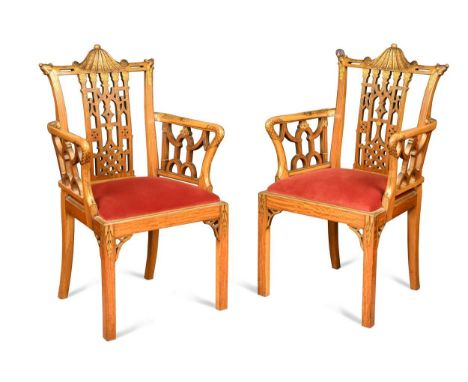 the carved pagoda top rails over a pierced back and sides with red upholstered drop seats raised on square chamfered legs wit