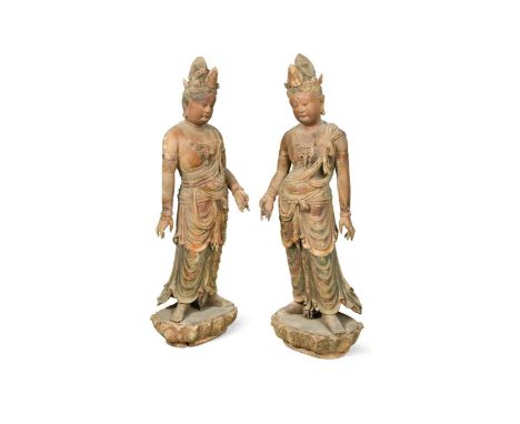 A large pair of Chinese carved wood and polychrome lacquered Bodhisattvas, Qing Dynasty or later, each graceful figure standi